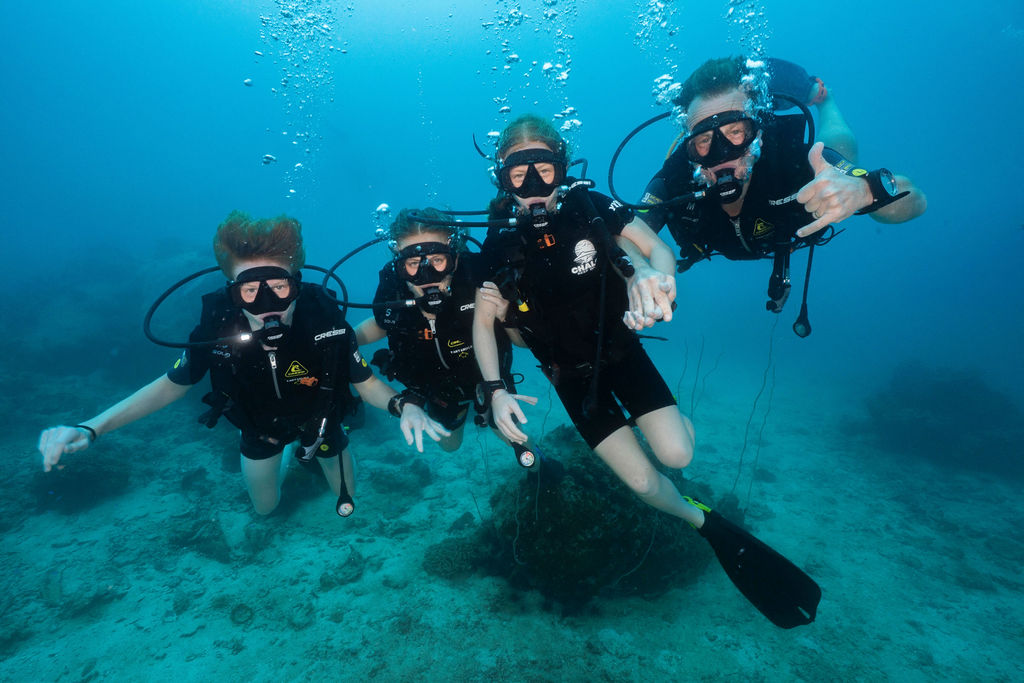 Students completing Advanced Diving Course in Koh Tao with instructor